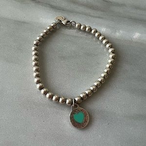 Tiffany & Co sterling silver with round tiffany blue bracelet